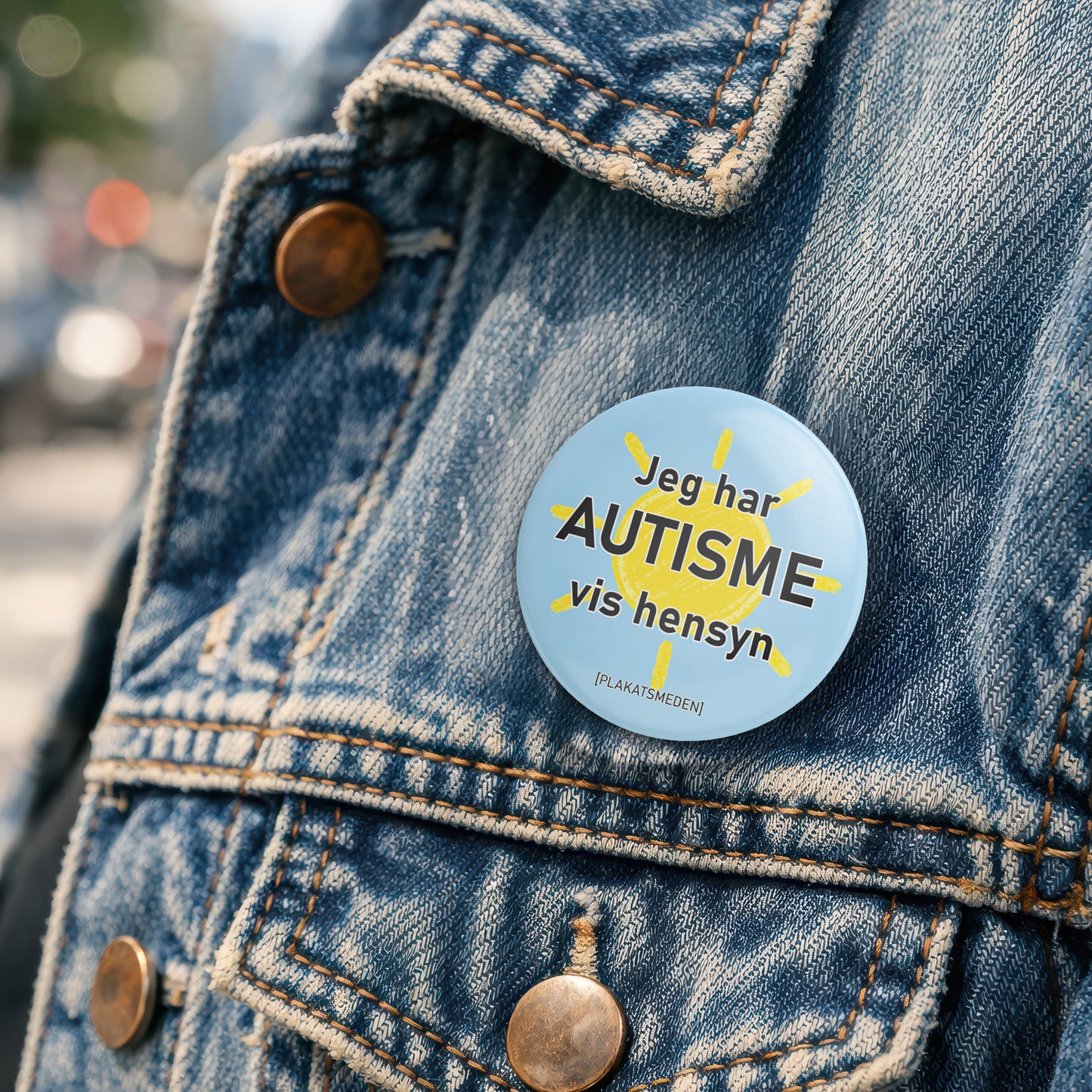 Jeg har autisme – vis hensyn" | badge med sol-motiv